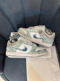 Nike SB Dunk Low "Year of the Dragon Steam Puppet" sneaker